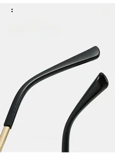 Detail view of ergonomic curved sunglasses temples for comfortable fit and sleek design
