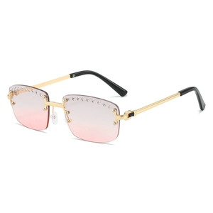 Chic rimless gradient pink sunglasses with rhinestone trim and gold metal temples