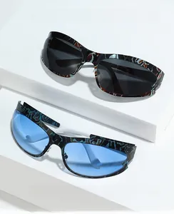 Detail of cat-eye sports sunglasses with leopard and marble patterns on wide frames