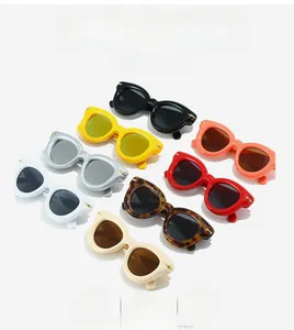 Detailed grid of oval puff sunglasses in multiple colors with stylish metal rivet accents