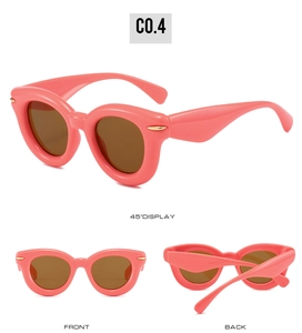 Pink inflatable oval sunglasses with gold accents shown in three perspective views