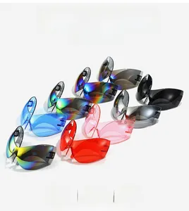 Detailed pile of colorful oversized wrap-around sports sunglasses with streamlined lenses
