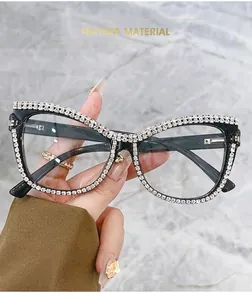 Close-up of cat-eye eyewear frames with luxury handcrafted diamond chain detailing