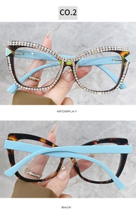 Cat eye glasses featuring crystal-encrusted frames and tortoiseshell temples