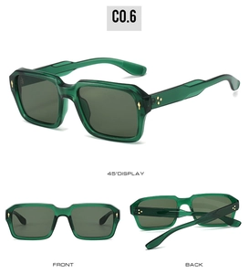 Macro detail of transparent green square sunglasses with golden metal rivets and dark lenses