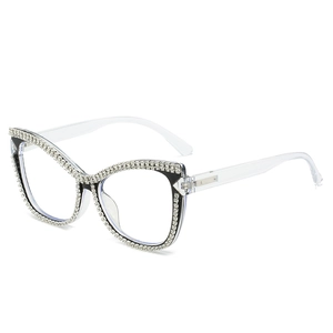 Luxury cat-eye glasses with double row rhinestone trim and clear temples on white