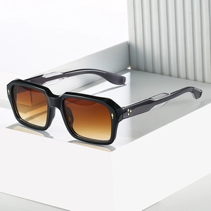 Classic square black sunglasses with brown gradient lenses and gold rivet accents
