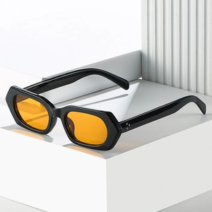 Modern hexagonal black sunglasses with orange lenses and metal rivet details