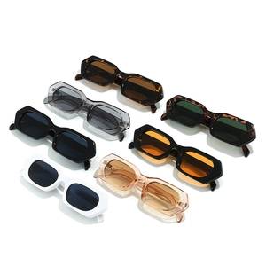 Multiple colors of retro thick frame polygon sunglasses arranged on white background