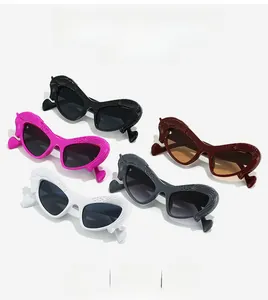 Detailed view of horse-shaped cat eye sunglasses frame with intricate mane texture details
