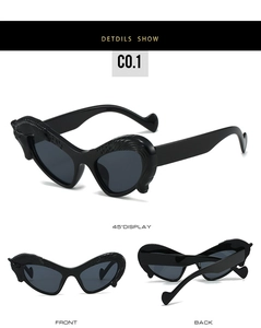 Detailed views of black cat-eye sunglasses with unique textured frames and ball tips