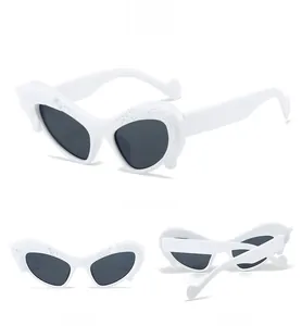 Three-view display of white cat-eye sunglasses with flame texture and dark grey lenses