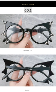 Detail show of bat-wing glasses frame with silver star and rhinestone embellishments