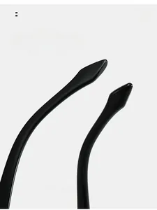 Macro shot of curved black mirror legs on stylish bat glasses for comfortable wear