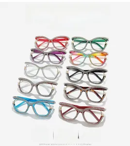 Close-up of luxury cat-eye glasses collection with rhinestones and pearl accents