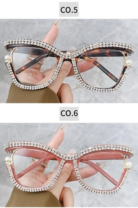 Detail of luxury cat-eye glasses with hand-set pearls and diamonds in tortoise and pink