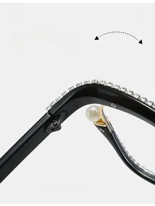 Detail showing durable hinges with pearl accents and sparkling rhinestones on black frames
