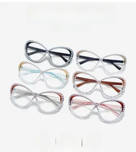 Detailed view of six colorful butterfly glasses frames with hand-set pearl embellishments