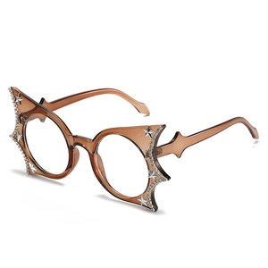 Fashion bat-shaped frames in amber with sparkling stars and rhinestones for women