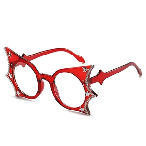Trendy red bat-shaped glasses frame with star rhinestones and sparkling metal stars