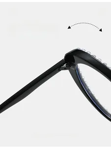 Macro detail of a durable metal hinge on stylish rhinestone cat-eye glasses
