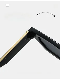 Close-up of durable reinforced hinges and gold metal trim on retro square sunglasses