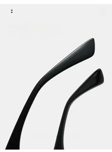 Detailed macro view of curved black glossy temple arms for ergonomic eyewear comfort