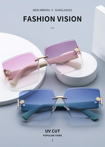 Detail of rimless gradient sunglasses featuring elegant golden rose temple decorations