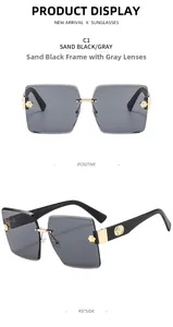 Detail view of rimless square sunglasses with gold hinges and sand black gray lenses