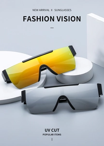 Detail of rimless wraparound sunglasses with orange reflective and gray lenses and UV protection