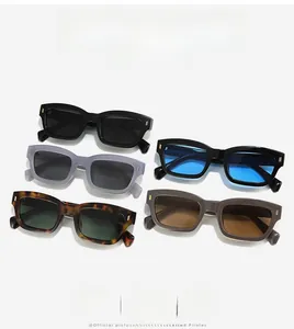 Detailed overview of small rectangular sunglasses in black, grey, and tortoiseshell colors