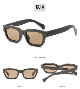Detail view of retro square sunglasses featuring dark frames and golden side accents