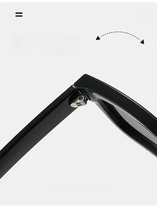 Macro shot of durable metal hinge structure and glossy black frame on sunglasses