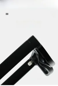 Close-up of the durable metal hinge and sleek temple of black square sunglasses