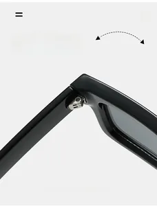Detail view of the durable metal texture hinge on retro square black sunglasses