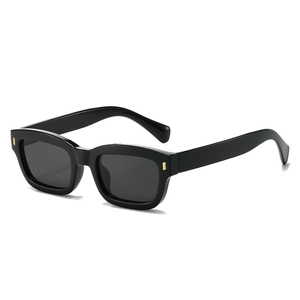 Modern black rectangle sunglasses with elegant gold accents on a clean white background