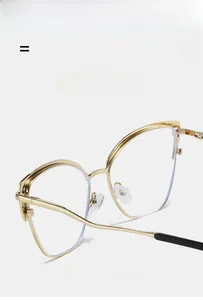Detailed close-up of golden cat-eye metal glasses frame with ultra-light texture material