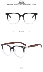 Detail of gradient black to clear frames with wood texture temples and silver rivets