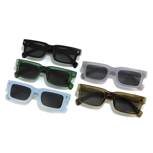 Five pairs of vintage square sunglasses in colorful transparent frames with gold hinge details
