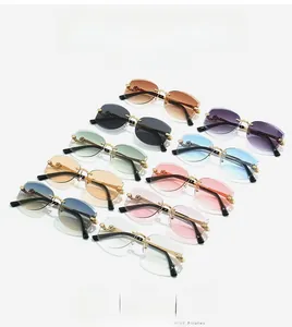 Détails de lunettes de soleil sans monture dégradées avec branches en métal doré