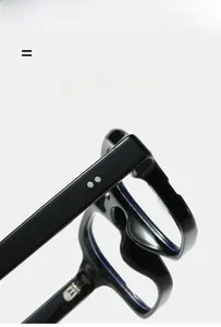Detail of square glasses frame hinge with silver metal studs and glossy black finish