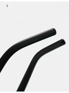 Detail shot of ergonomic curved black temple tips on stylish square eyewear frames