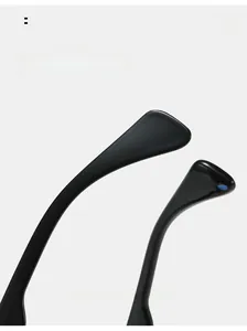 Detail of ergonomic curved mirror legs on stylish black anti-blue light glasses