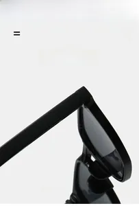 Close-up of lightweight black polygon sunglasses frame with flexible metal hinge detail