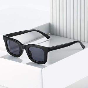 Classic black square frame sunglasses with glossy finish on geometric white stands