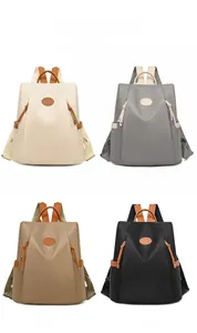 Collage of four waterproof anti-theft backpacks in beige, grey, khaki, and black colors
