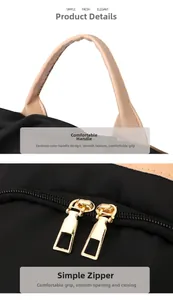 Detail of ergonomic beige leather handles and smooth golden double zippers on black backpack