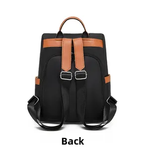 Back view of waterproof oxford backpack featuring adjustable straps and brown leather trim