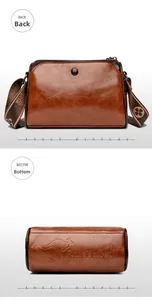 Detail view of the vintage wax leather pillow bag featuring a branded bottom and patterned strap