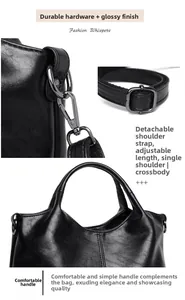 Detail view of adjustable, detachable straps and metallic buckles on black soft leather bag